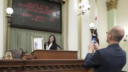 Assemblymember McCarty Takes a Photo of Woman of the Year Basira Alam